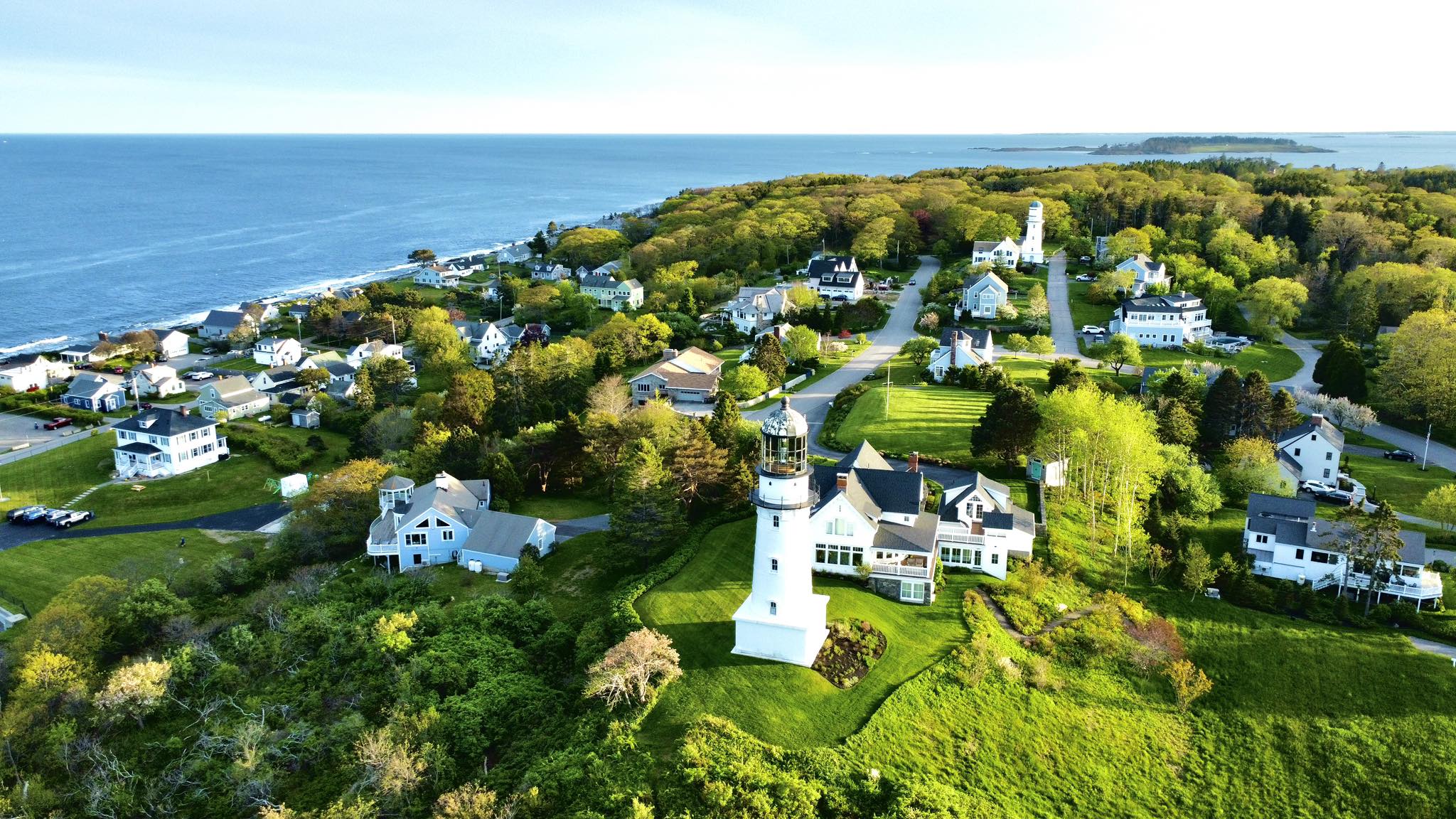 Panoramic view from Two Lights State Park showing coastline and lighthouse