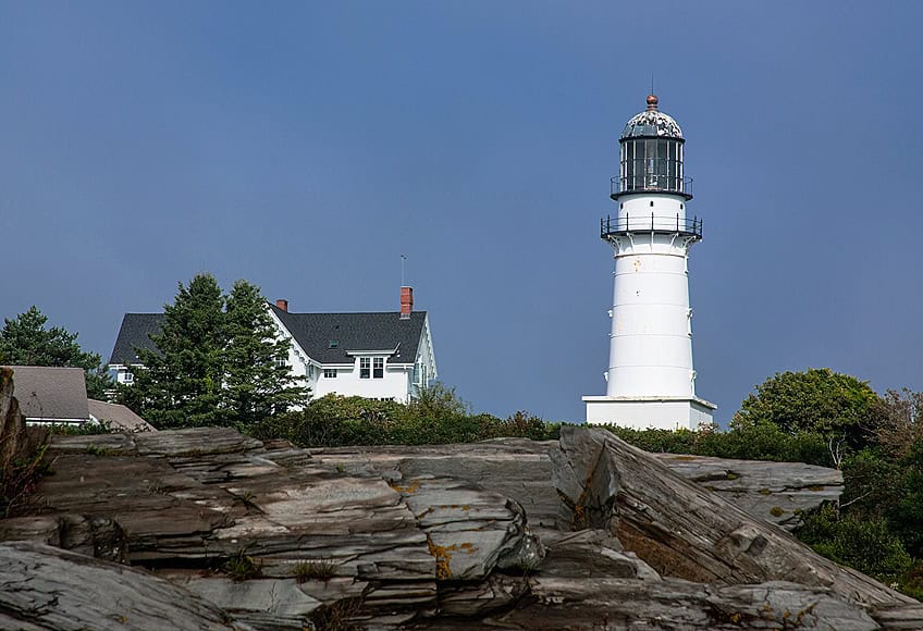 Cape Elizabeth Light (Two Lights) lighthouse tower against blue sky